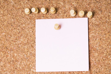 Colored post-it on corkboard