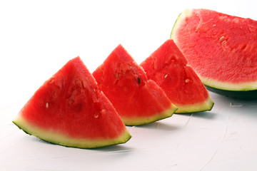 Tasty fresh appetizing watermelon drink smoothie. Watermelon drink in glasses with slices