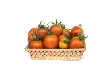  Group of tomatoes in a wicker basket