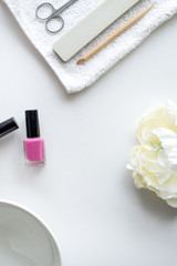 Obraz na płótnie Canvas White table with pink polish for nail care
