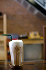Ice latte with milk foam
