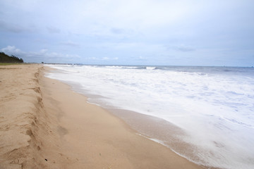 Fototapeta na wymiar Sea wave to the beach and sand on summer time.