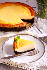 Cheesecake on chocolate base, sliced