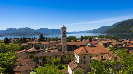 Obraz premium View over Maccagno to the southern part of Lake Maggiore - Maccagno, Lake Maggiore, Varese, Lombardy, Italy