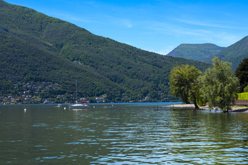 Fototapeta na wymiar The bathing beach of Maccagno on Lake Maggiore - Maccagno, Lake Maggiore, Varese, Lombardy, Italy