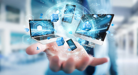 Tech devices connected to each other by businessman 3D rendering