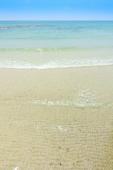 Beautiful crystal clear sea and tropical beach at tropical paradise island, Thailand