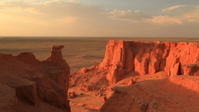 Sunset over the canyon Bayanzag in Mongolia