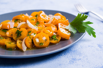Salad of yellow tomato