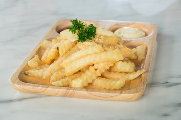 French fries and dip sauce.