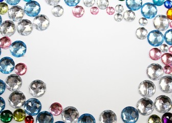 Colorful shiny sparkling jewelry circle stones glitters gems frame background