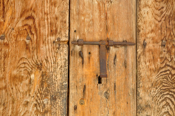 Old lock in a wood door