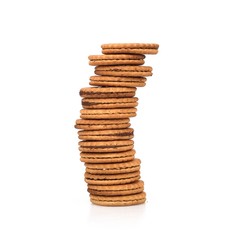 Round biscuits with chocolate filling on a white background