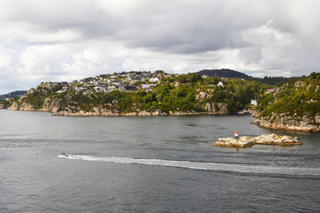 Obraz premium Boat crossing the jford drom Bergen in Norway