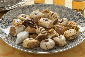 Fototapeta na wymiar Traditional festive Moroccan cookies and tea