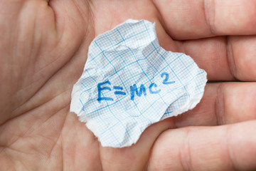 The formula E   mc2 in the hand. Crib. © Andrii Zastrozhnov