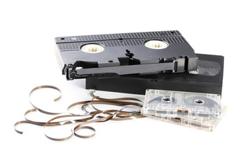 Video and music cassette tapes isolated on white background