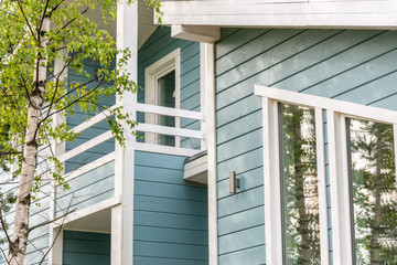 Wooden house with balcony © Evgeny Korshenkov