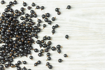 Delicious black berries on white background. Cooking background. Top view copy space.