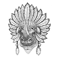 Rhinoceros, rhino Wild animal wearing indiat hat with feathers Boho style vintage engraving illustration Image for tattoo, logo, badge, emblem, poster