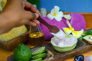 Spa; massage compress balls, herbal ball on the wooden with treatments spa , Thailand. Healthy Concept