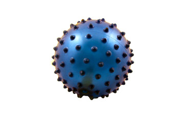 Spiky rubber massage ball isolated on the white background, close-up.