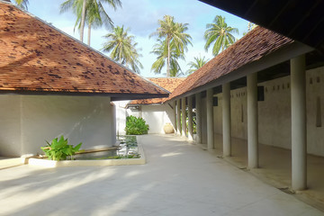 The Beautiful view of space and light,shade and shadow,the row of cloumn with the minial style and design of peaceful tropical architecture.