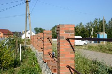 Broun brick fence colums
