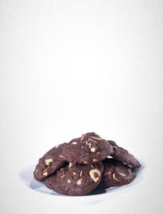 Cookies or Almonds chocolate cookies on background.