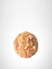 Cookies or Almonds chocolate cookies on background.