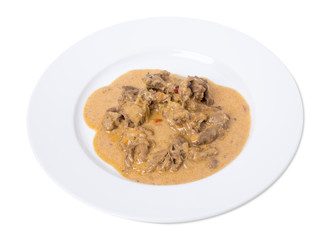 Roast meat in a white sauce.