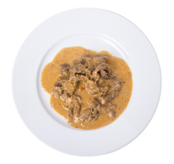 Roast meat in a white sauce.