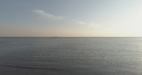 Obraz premium Aerial shot over baltic sea in bright sunset time