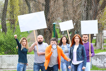 Group of protesting young people on street