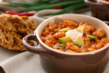 Casserole with delicious chili turkey on napkin