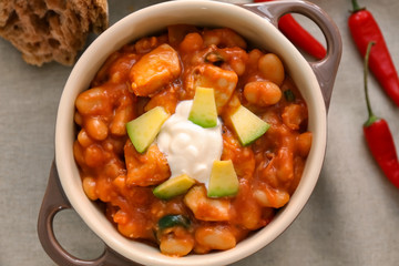 Casserole with delicious chili turkey on napkin