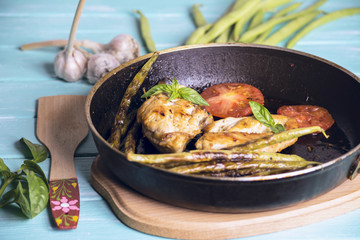 Fried chicken meat and asparagus