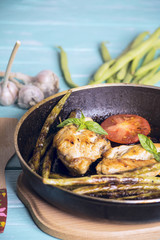 Fried chicken meat and asparagus