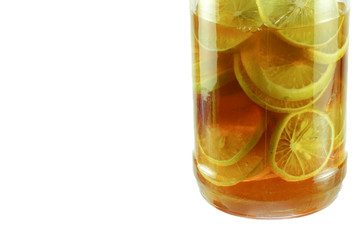 Honey lime in bottle isolated white