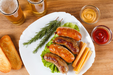 Oktoberfest traditional beer menu. Fried sausages with toast and mustard.
