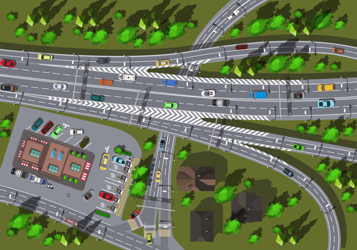 large high-speed interchange of the highway with a store and a crossroads top view