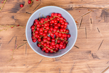 red currants on a wooden