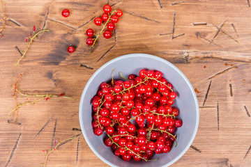 red currants on a wooden