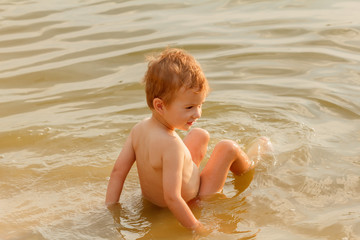 Child swimming lake.