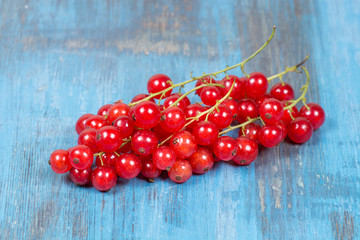 red currants on a wooden