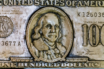 concrete workpiece in the form of US dollars