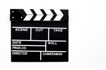 Fototapeta na wymiar Filmmaker profession. Clapperboard on white background top view