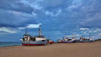 Evening at Thorup Beach, Denmark. Fishing boats.