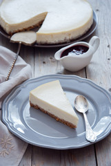Homemade cheesecake with berry sauce
