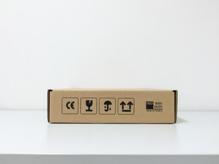 Paper cardboard box package on white table and white background